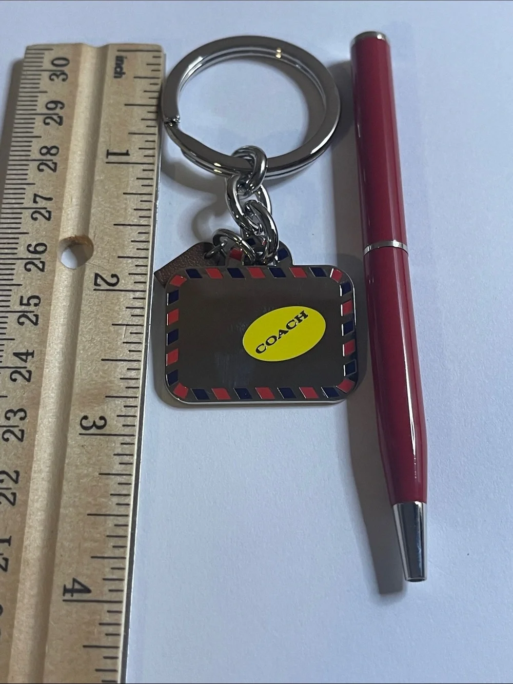COACH Silver Bag Keychain and Coach Pen
